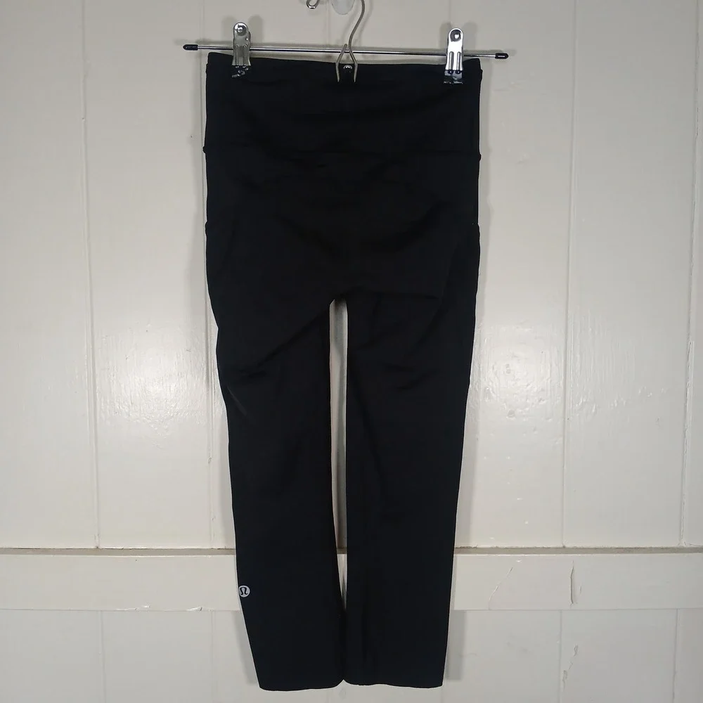 Lululemon Speed Up Crop Leggings Womens 2 Black High Rise Pockets Reflective